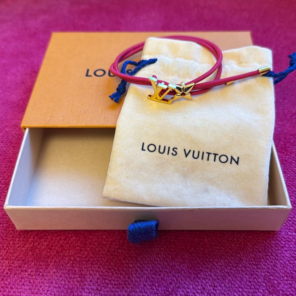 Authentic LV bracelet. Dark pink color comes with dust bag not the box